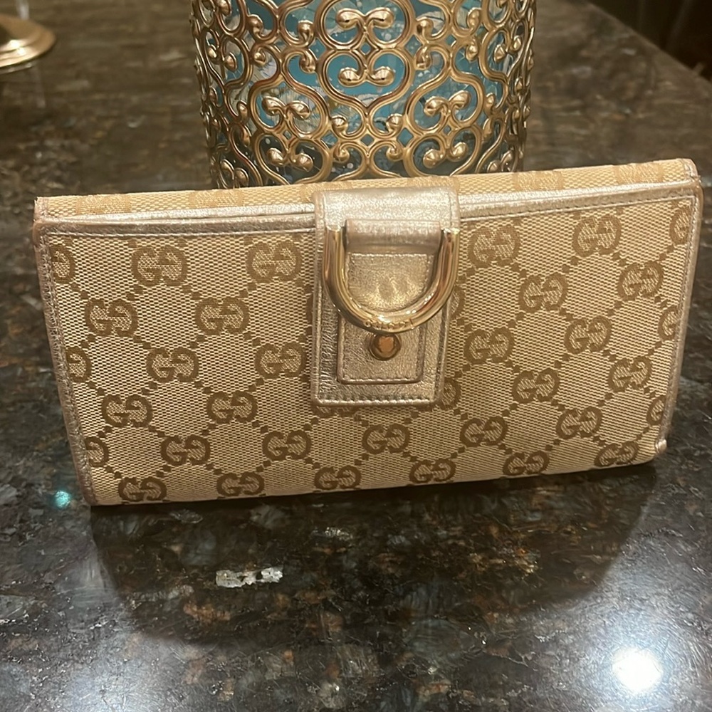 Gucci large snap wallet.  Authentic